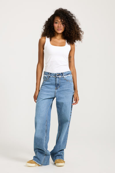 Unfinished studded Denim Mid Wash