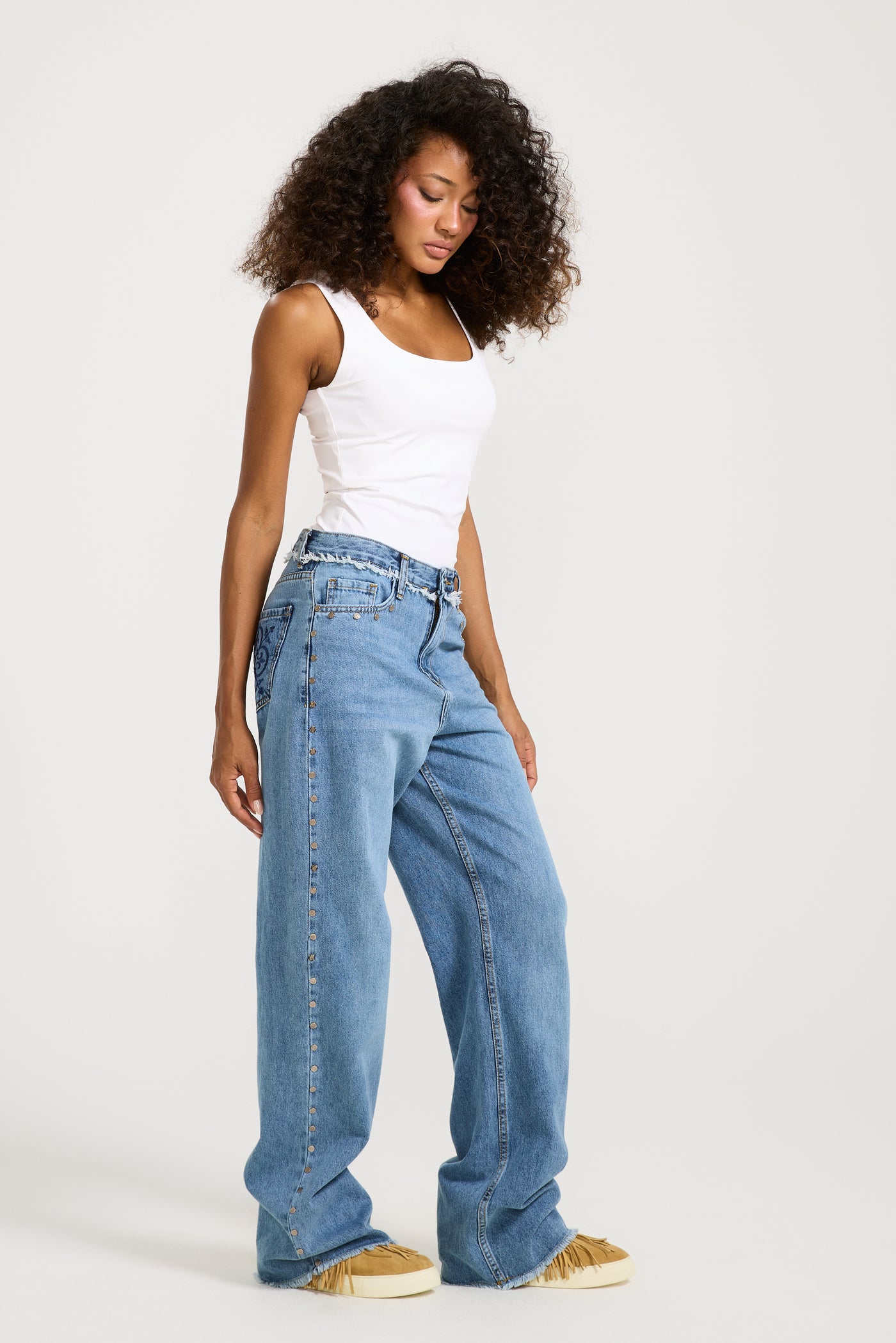 Unfinished studded Denim Mid Wash