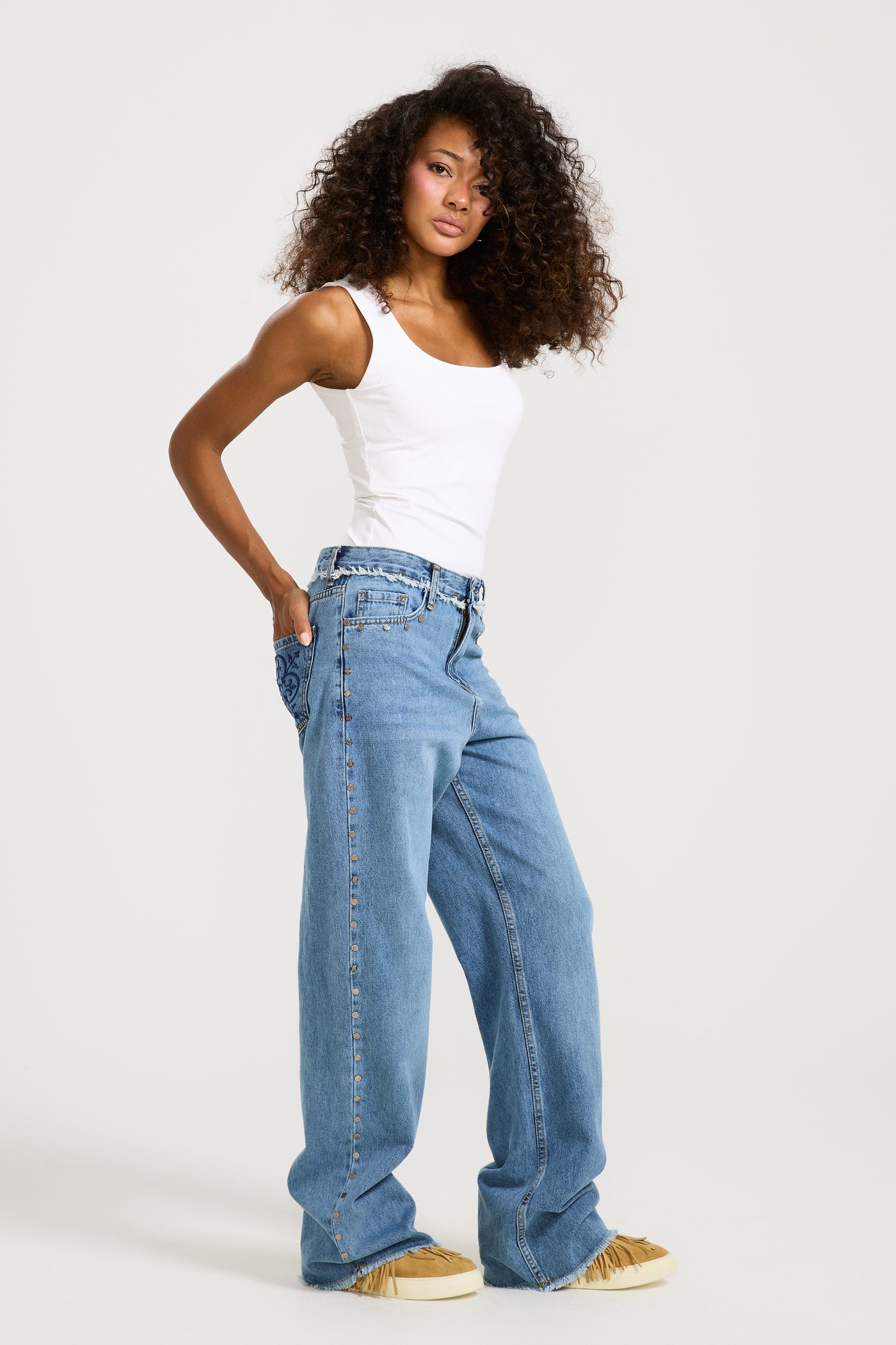 Unfinished studded Denim Mid Wash