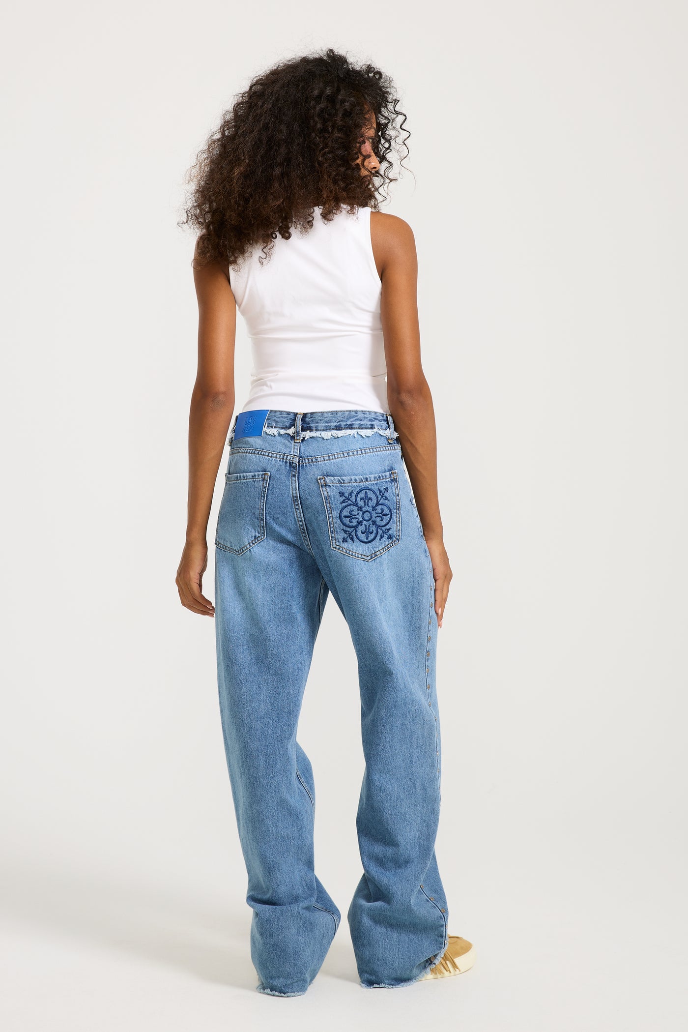 Unfinished studded Denim Mid Wash